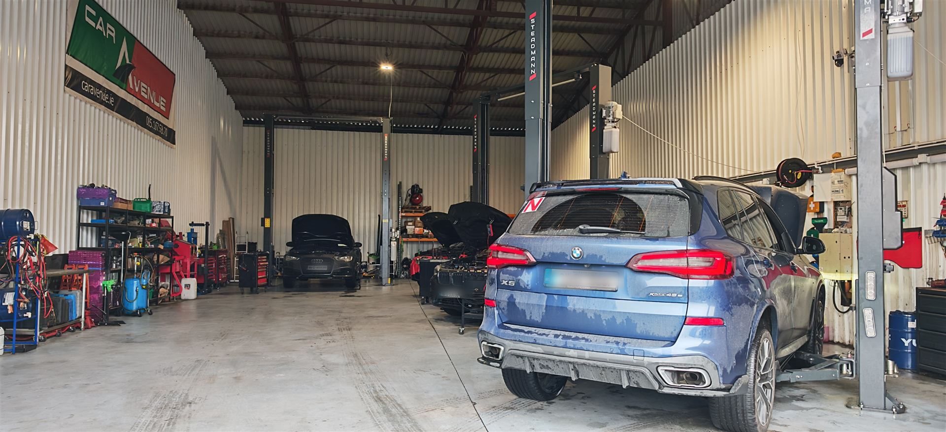 BMW X5 undergoing service at Car Avenue workshop in Ashbourne