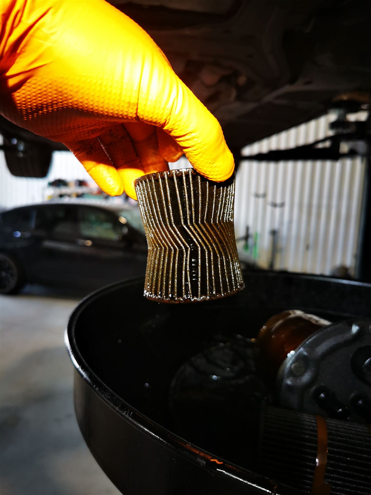Used oil filter removed during an oil change at Car Avenue in Ashbourne